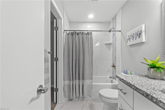 full bathroom featuring toilet, vanity, and shower / tub combo