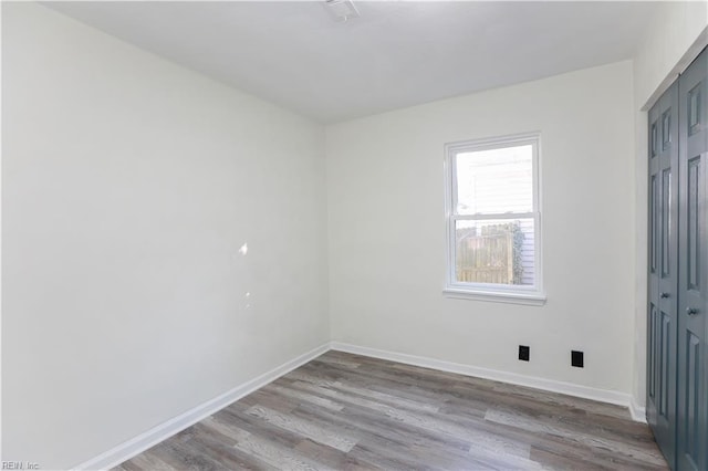 unfurnished room featuring light hardwood / wood-style floors