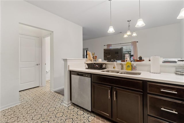 kitchen with dark brown cabinetry, stainless steel dishwasher, hanging light fixtures, and sink