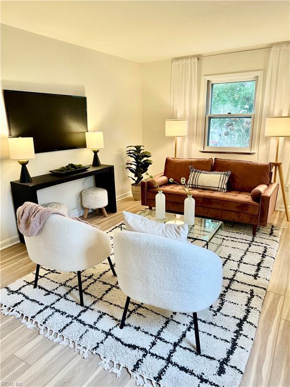 living room with wood-type flooring