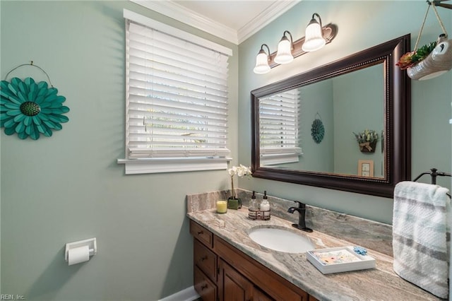 bathroom with vanity and crown molding