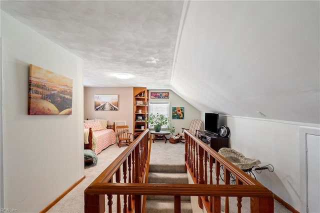 interior space with carpet floors and lofted ceiling