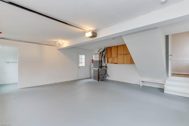 garage with heating unit and a garage door opener