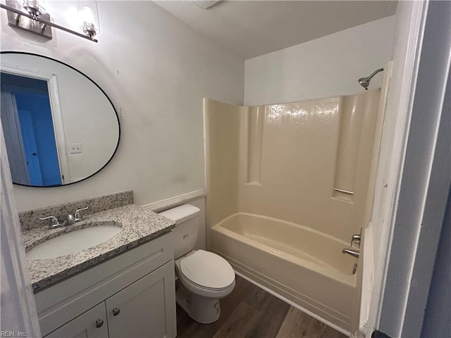 full bathroom with toilet, shower / bath combination, wood-type flooring, and vanity