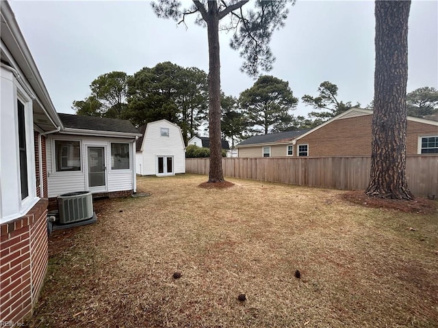 view of yard with central AC unit