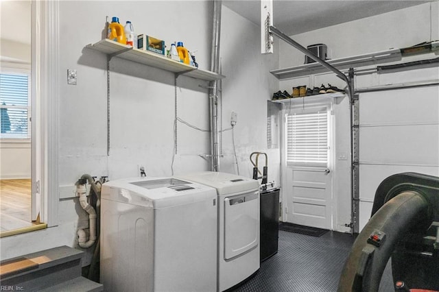 laundry area featuring separate washer and dryer