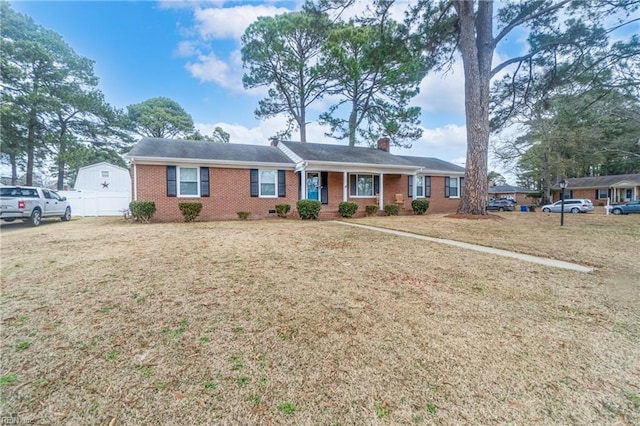 single story home with a front yard