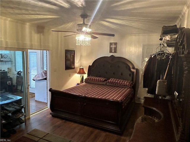 bedroom with ceiling fan and hardwood / wood-style flooring