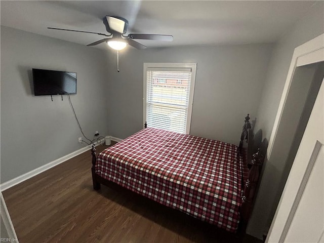 bedroom featuring dark wood-type flooring and ceiling fan