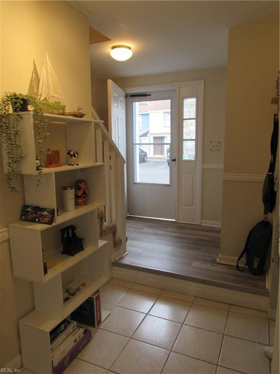 foyer entrance with light tile patterned floors