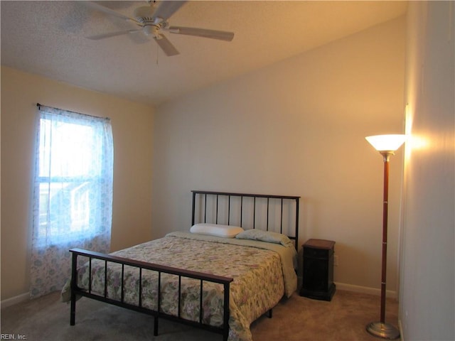 bedroom featuring ceiling fan and carpet flooring