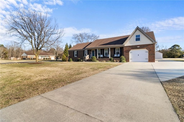 view of front of house with a garage and a front lawn