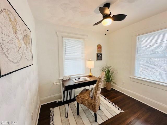 office area featuring ceiling fan and dark hardwood / wood-style flooring