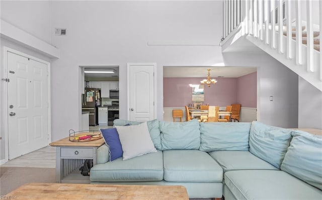 living room featuring a chandelier