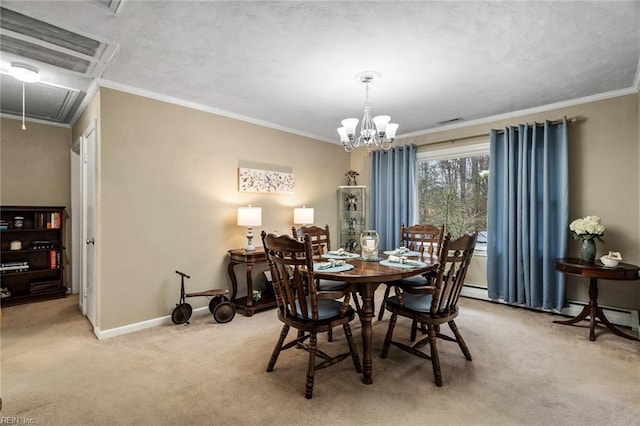 dining room with an inviting chandelier, crown molding, and light carpet