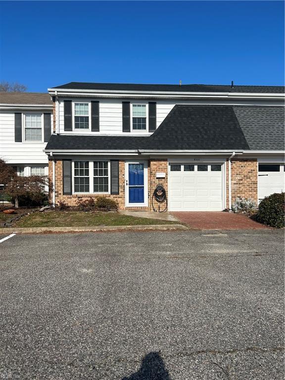 view of property featuring a garage