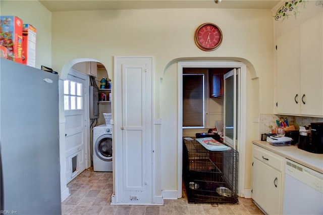 laundry room with washer / dryer