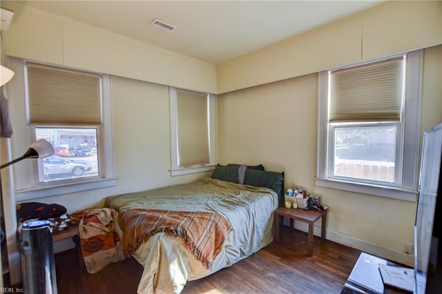 bedroom featuring dark hardwood / wood-style flooring