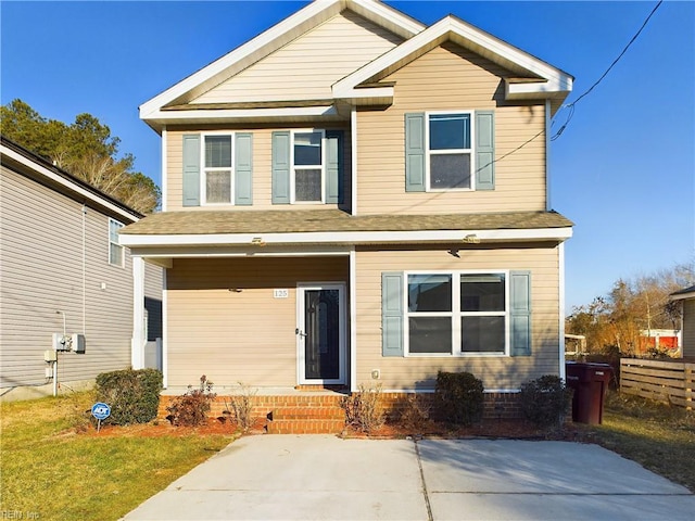 view of front of home with a front lawn