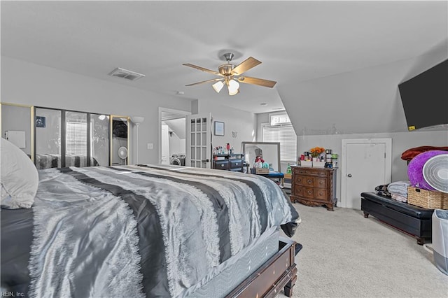 bedroom featuring ceiling fan, light carpet, and lofted ceiling