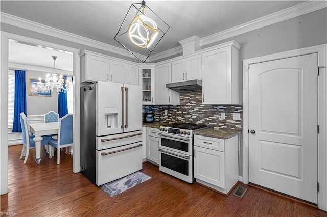 kitchen featuring double oven range, white cabinetry, and high end fridge