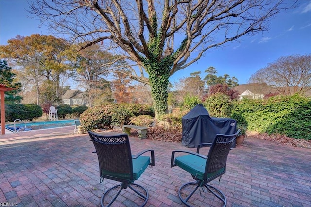 view of patio with a grill