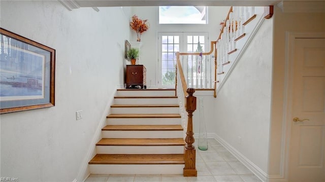 stairway with french doors