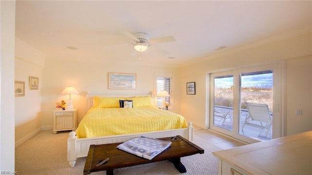 bedroom featuring ceiling fan, access to exterior, and ornamental molding