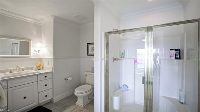 bathroom with toilet, vanity, tile patterned floors, ornamental molding, and a shower with door