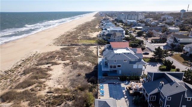 aerial view with a beach view and a water view