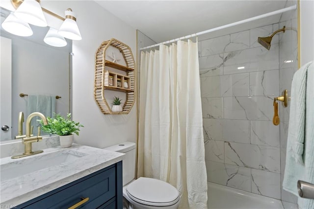 full bathroom with vanity, shower / tub combo, and toilet