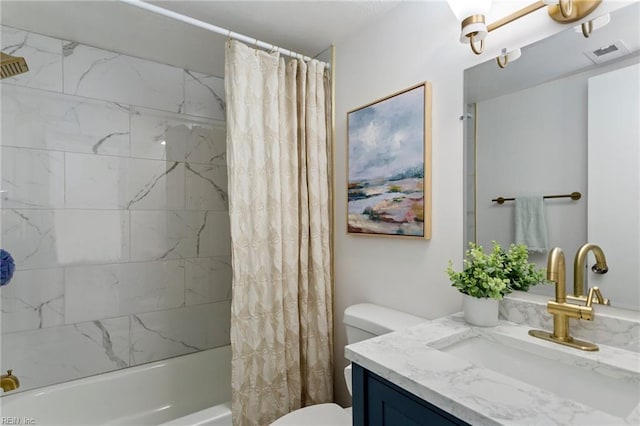 full bathroom with vanity, toilet, and shower / bath combo with shower curtain