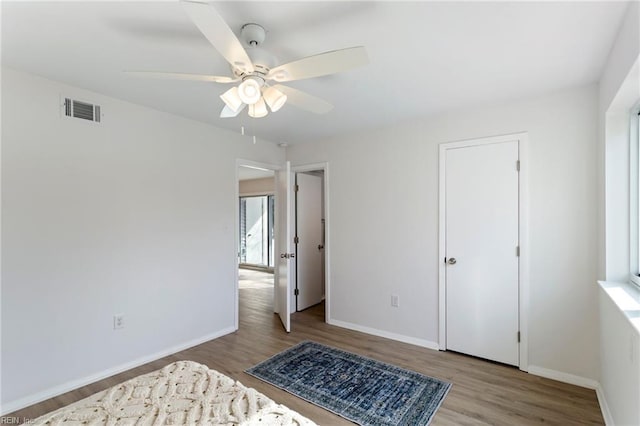 bedroom featuring ceiling fan and light wood-type flooring