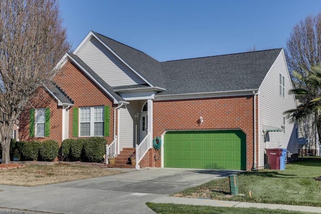 view of front of house featuring a garage and a front lawn