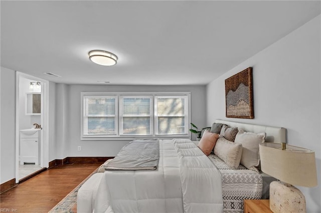 bedroom featuring dark hardwood / wood-style floors