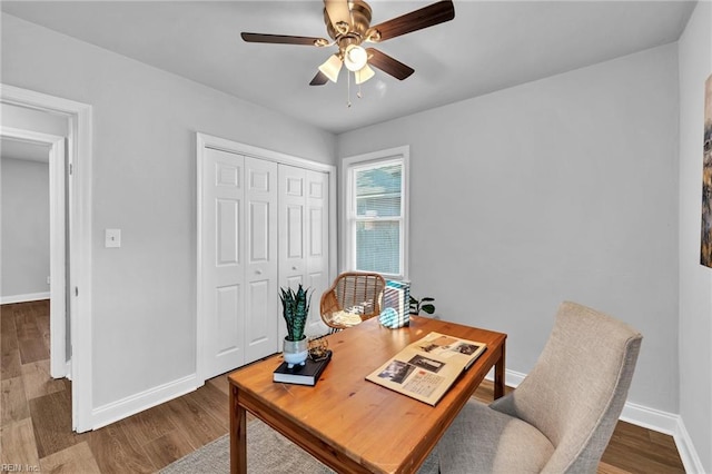 office space featuring ceiling fan and hardwood / wood-style floors