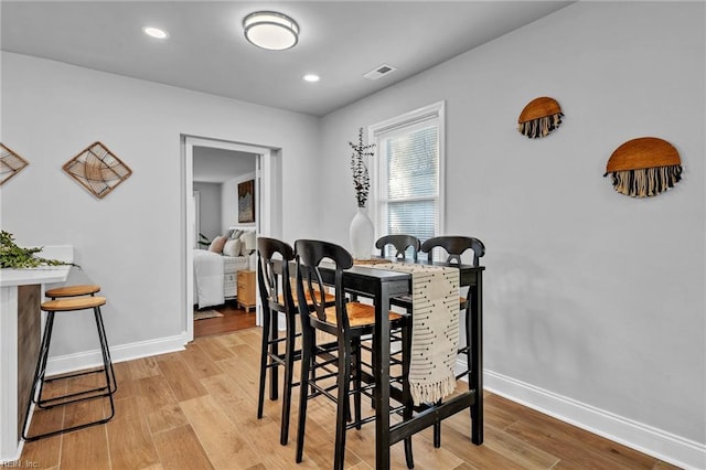 dining room featuring light hardwood / wood-style floors