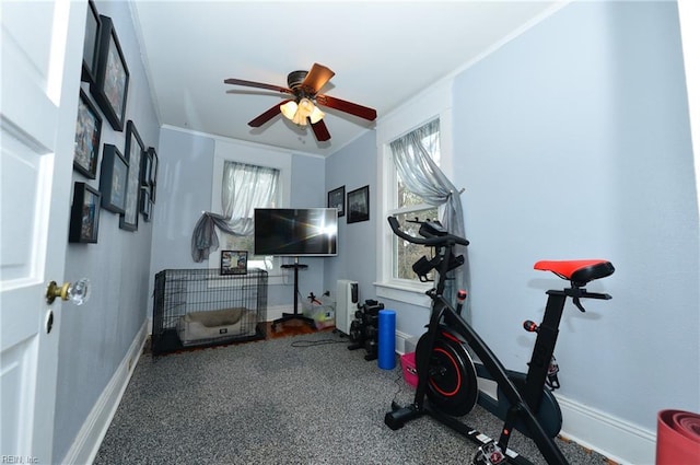 workout room with ceiling fan