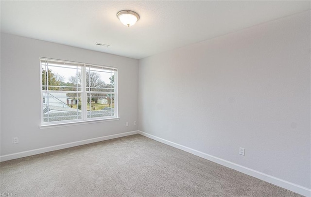 empty room featuring carpet