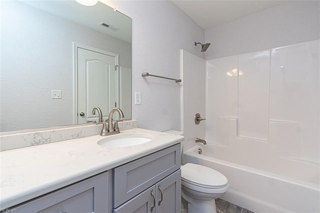 full bathroom with toilet, bathtub / shower combination, and vanity