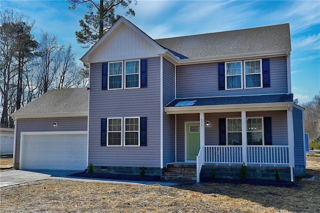 view of front of property featuring a garage and covered porch