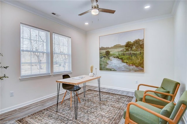 office area featuring ceiling fan, ornamental molding, and hardwood / wood-style flooring