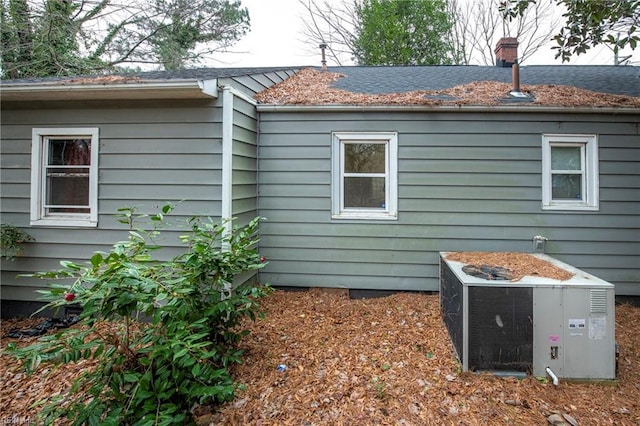 view of home's exterior with central air condition unit