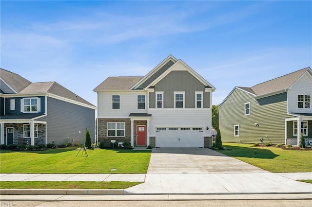 view of front of property featuring a garage and a front yard