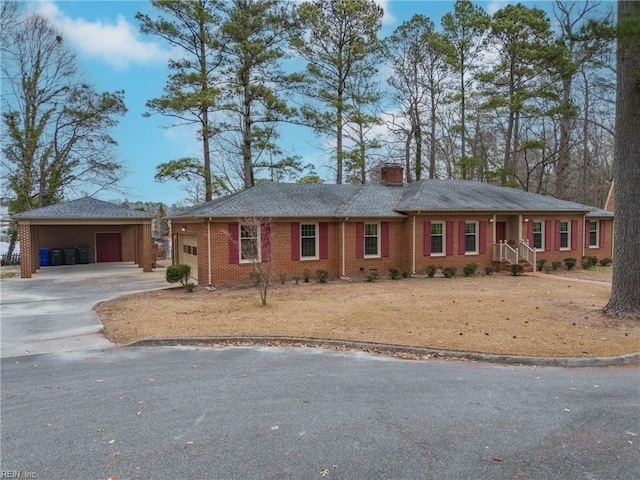 ranch-style home featuring a garage