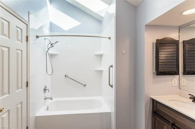 bathroom featuring vanity and tub / shower combination