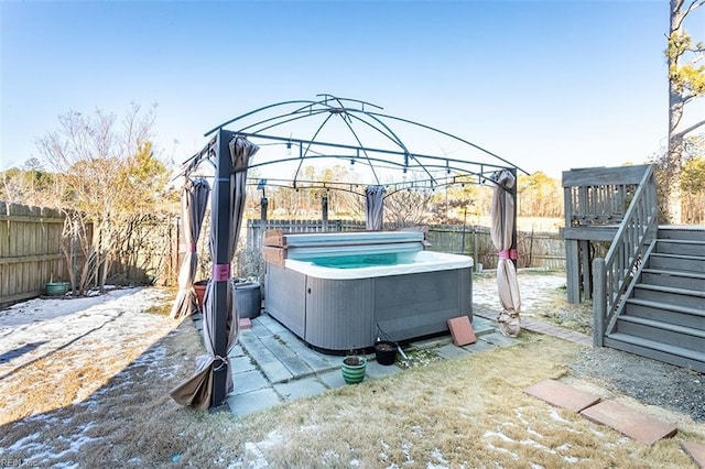 view of patio with a gazebo and a hot tub