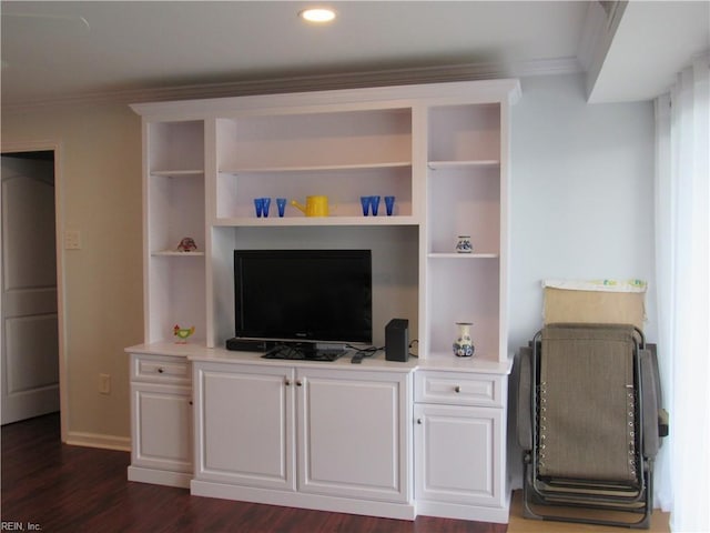 living room with dark hardwood / wood-style flooring and ornamental molding