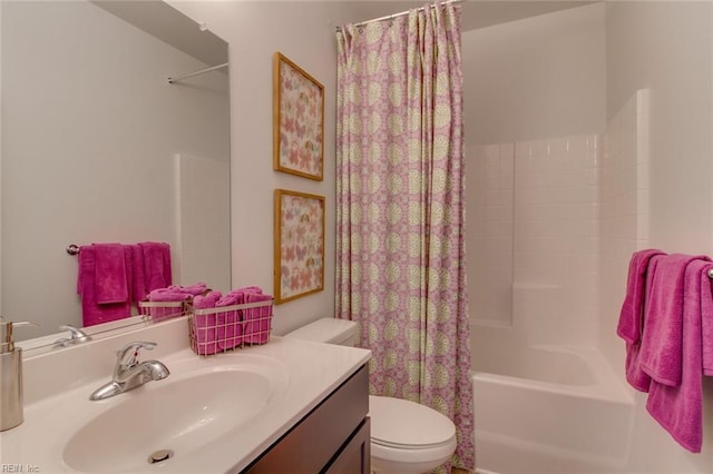 full bathroom featuring toilet, vanity, and shower / tub combo with curtain