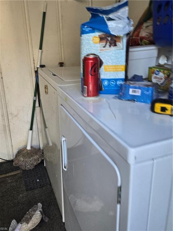 laundry room featuring washing machine and dryer